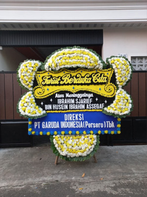 Papan Bunga Duka di Giri